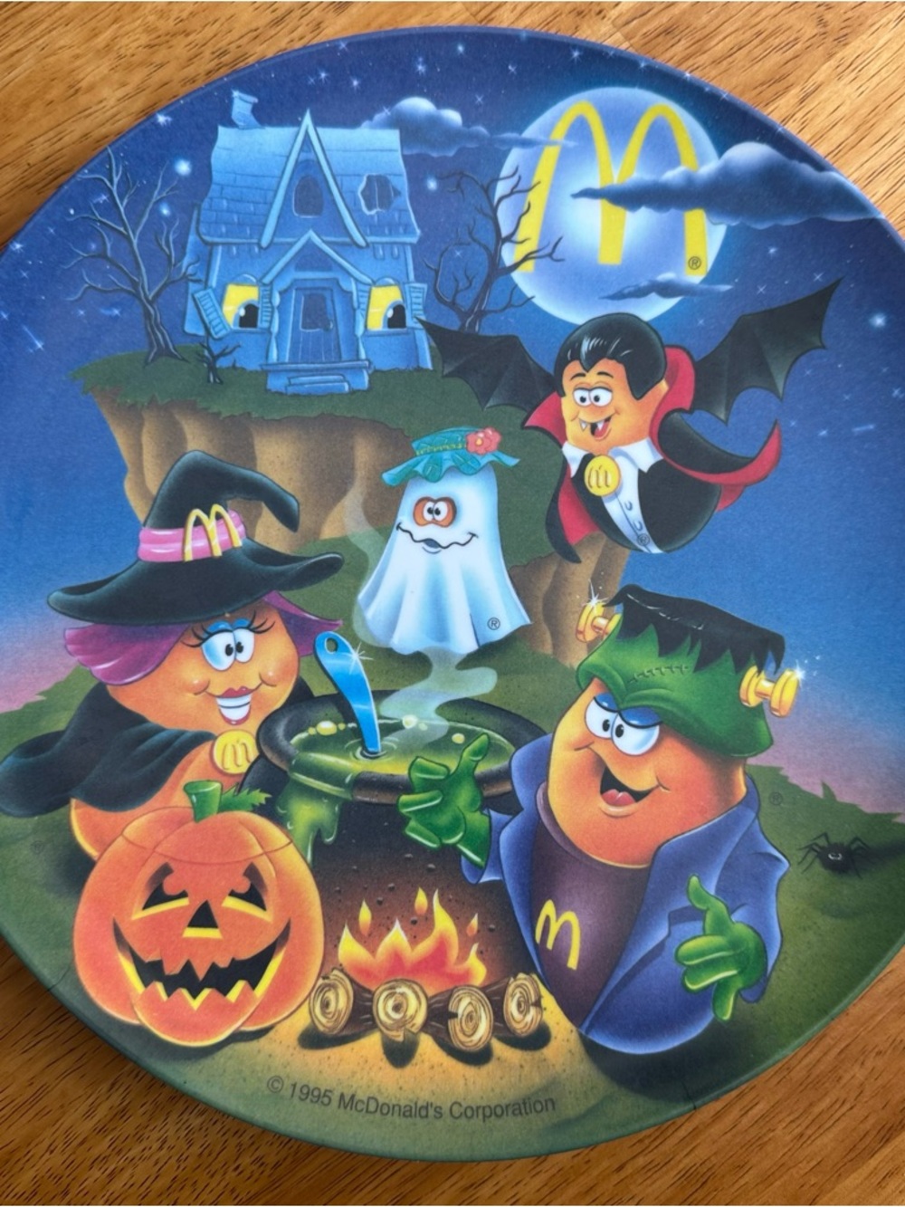 1995 children’s McDonald’s Halloween and a Christmas dinner plates 9.5”